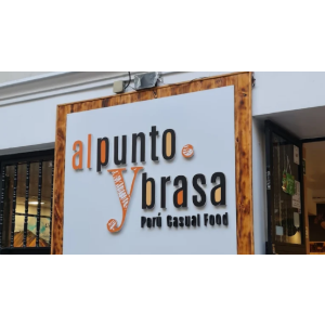 Logo de Al Punto y Brasa | Restaurante Peruano Madrid